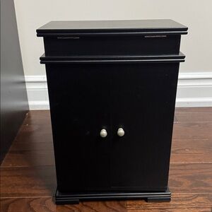 Sleek Black Jewelry Organizer Cabinet